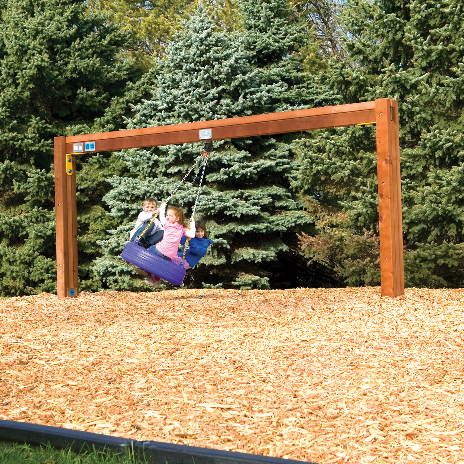 Rainbow Play Village In-Ground Commercial Tire Swing Beam with 100% cedar construction, powder-coated hardware, and commercial playground tire swing designed for schools, parks, churches, daycare centers, and community playgrounds.